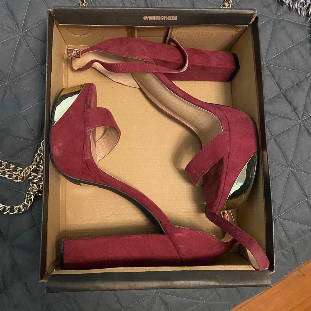 Red chunk heels with gold plated toe